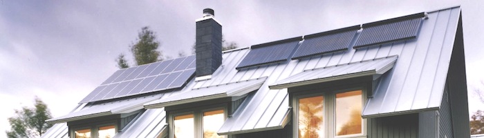 Apricus solar thermal collector and PV on house